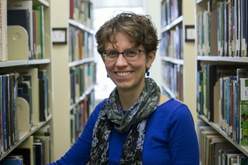 Librarian Dana Ingalls in Library stacks.